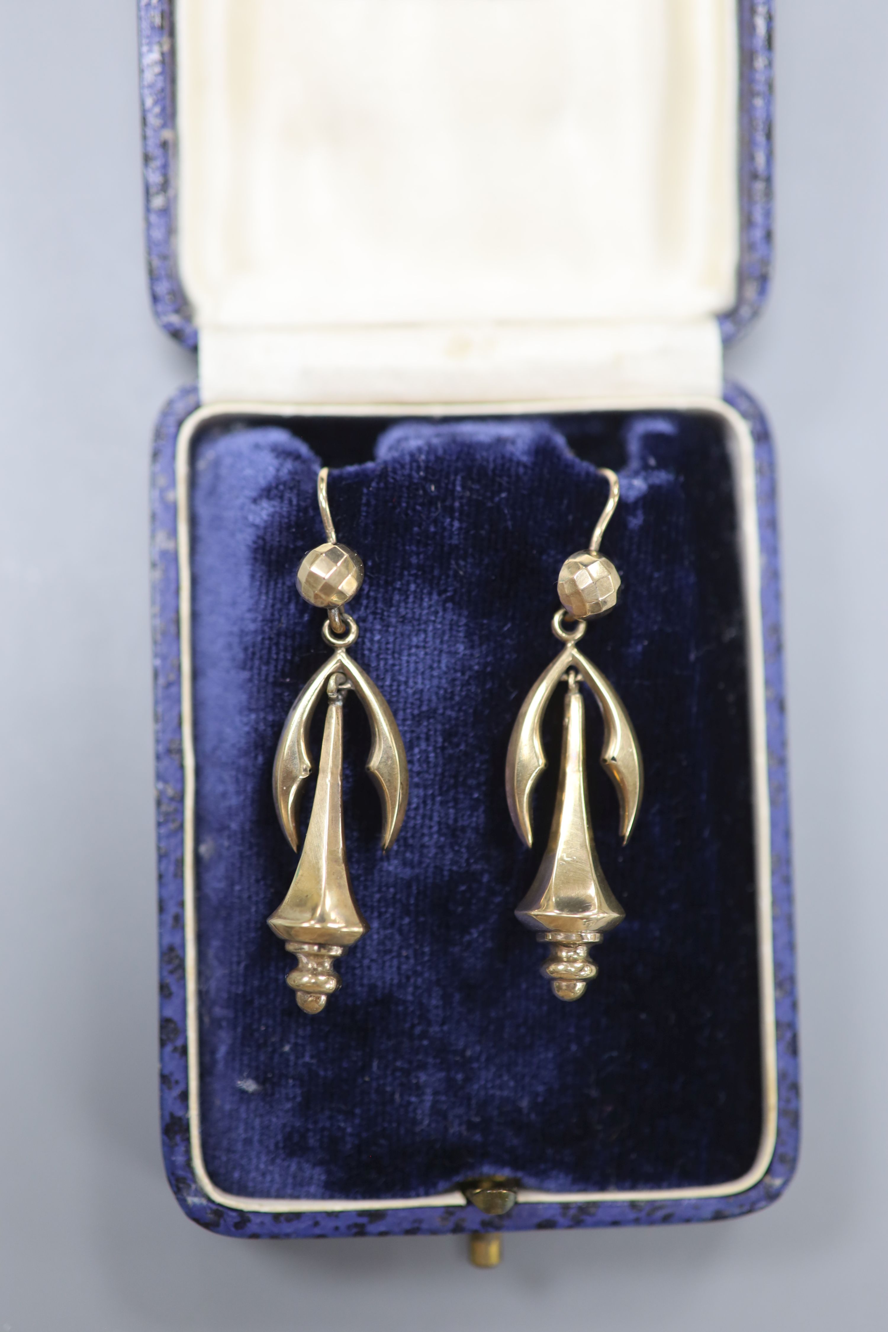 A pair of early 20th century yellow metal drop earrings, overall 49mm, 3.8 grams.